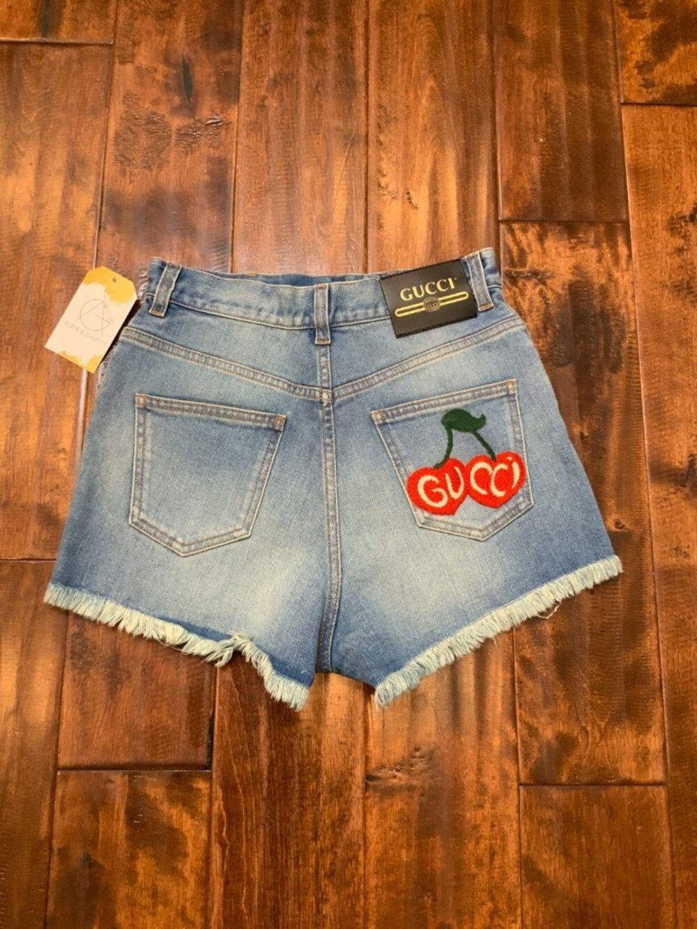 GUCCI Blue Denim High Waist Cutoff Shorts w/ Cherry Embroidery, Size 25